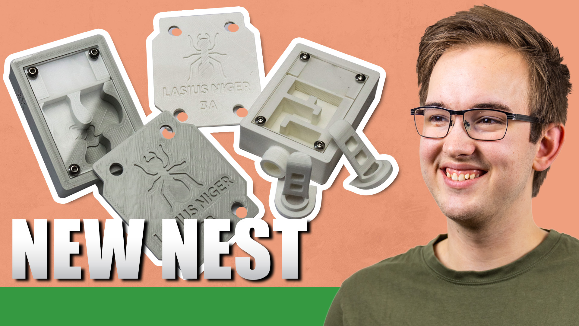 A man looking happy next to an ant kit.