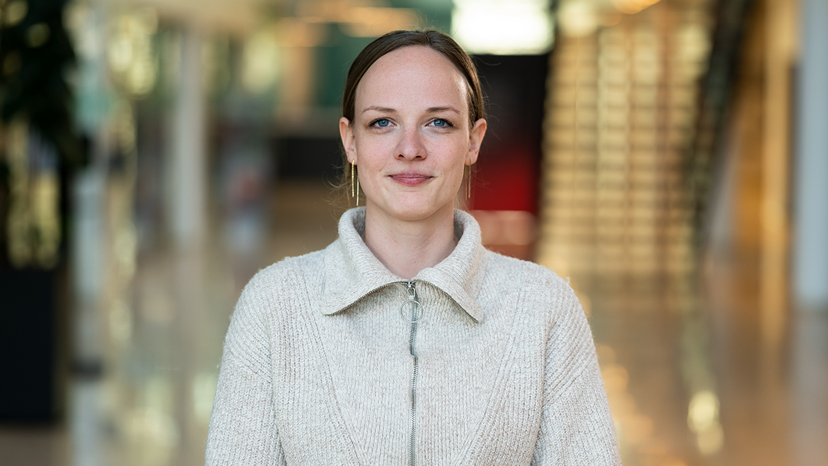 A woman smiling.