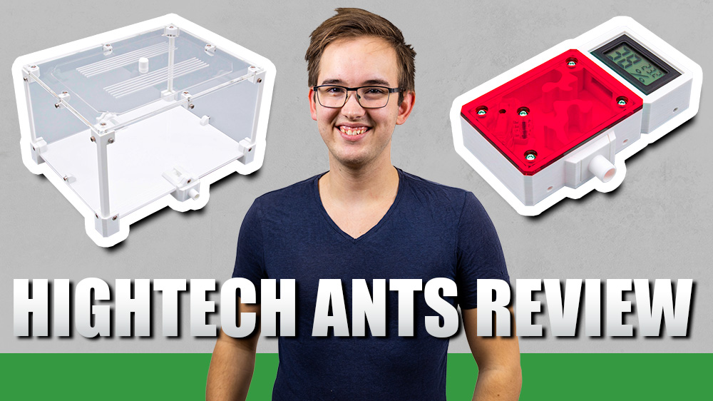 A man looking happy next to ant kits.