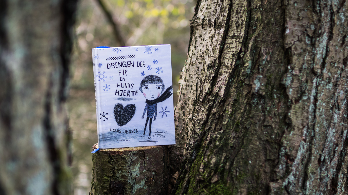 A book standing on a branch.
