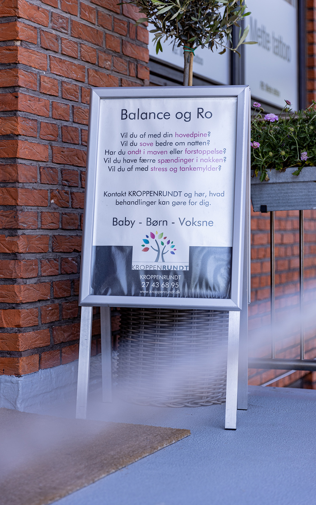 A sign with text on it.