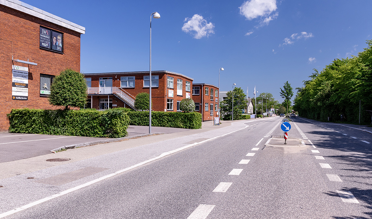 A road with buildings next to it.