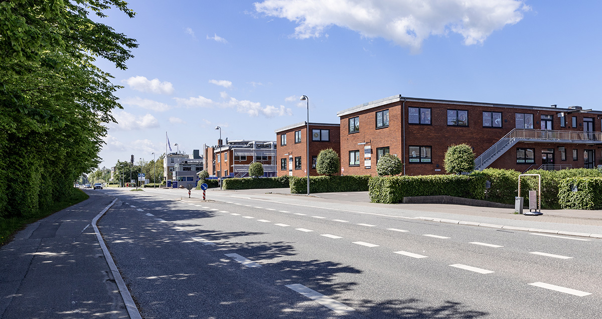 A road with buildings next to it.
