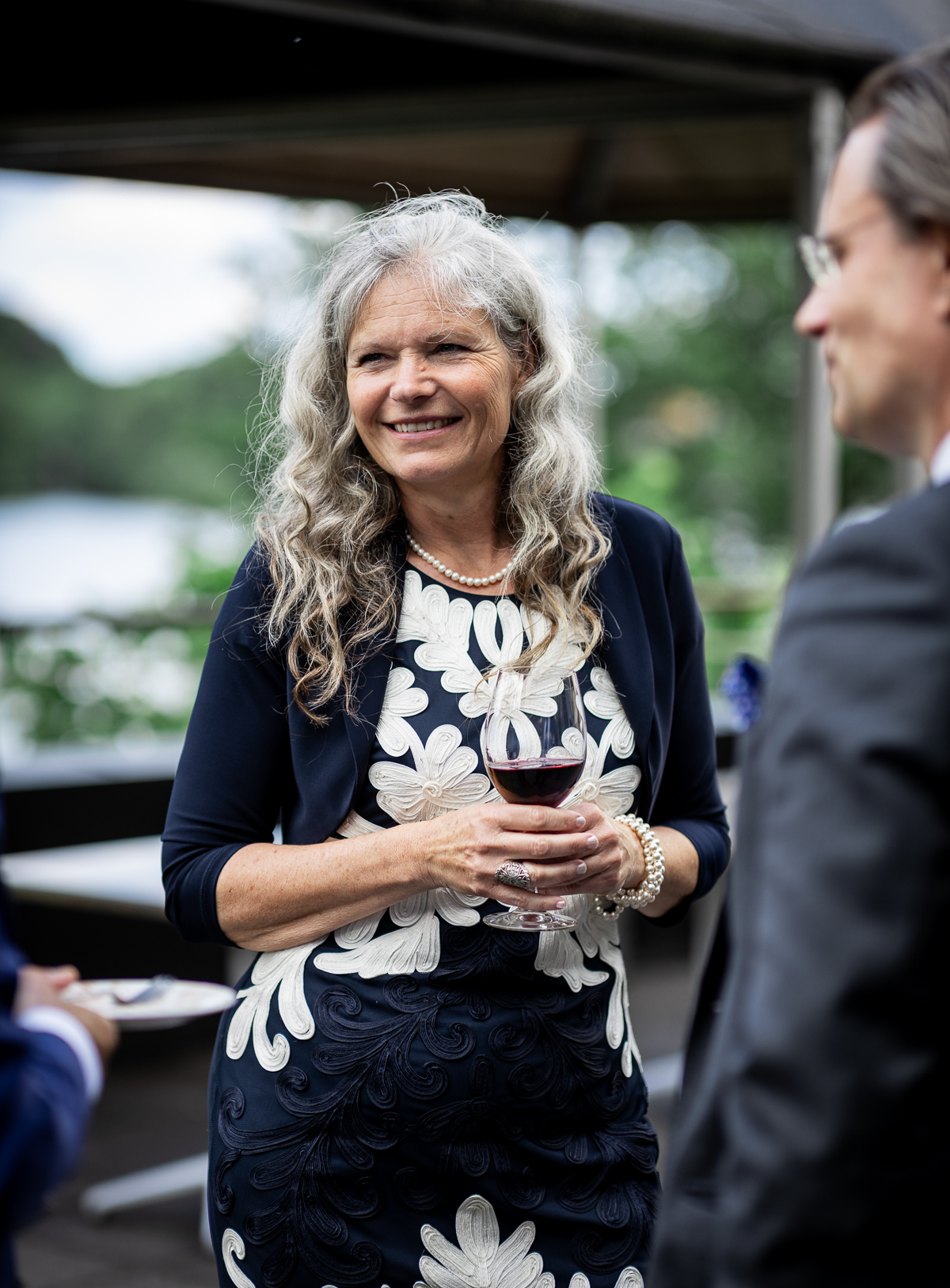 A woman smiling.