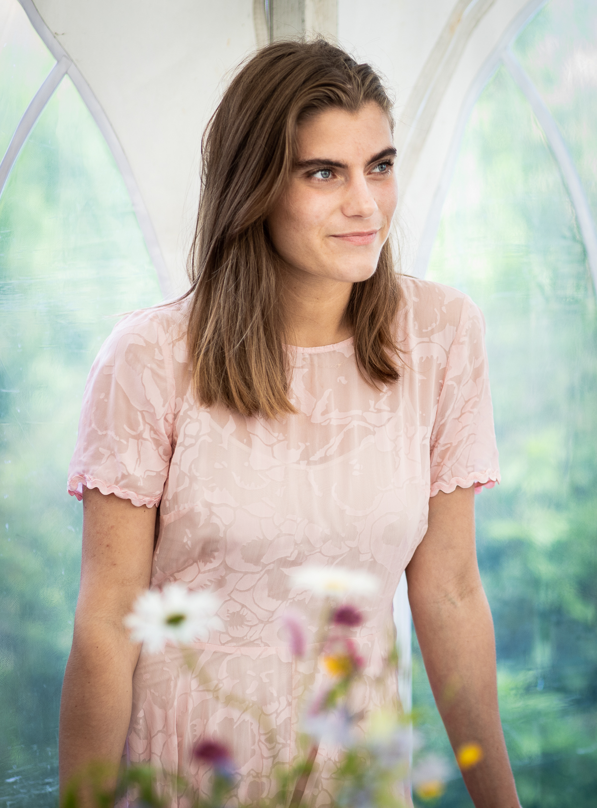A woman smiling.