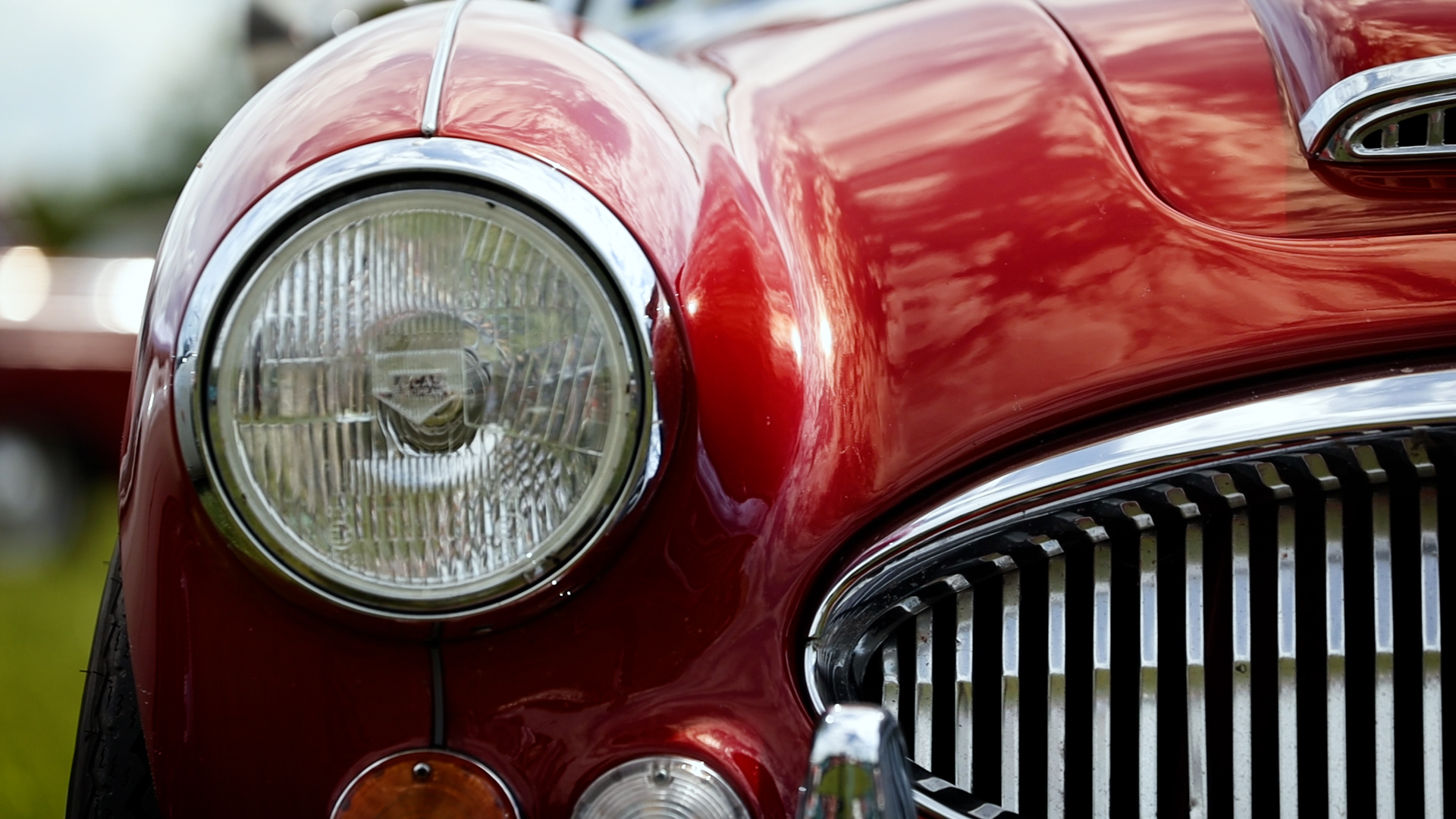 The front of a red car.