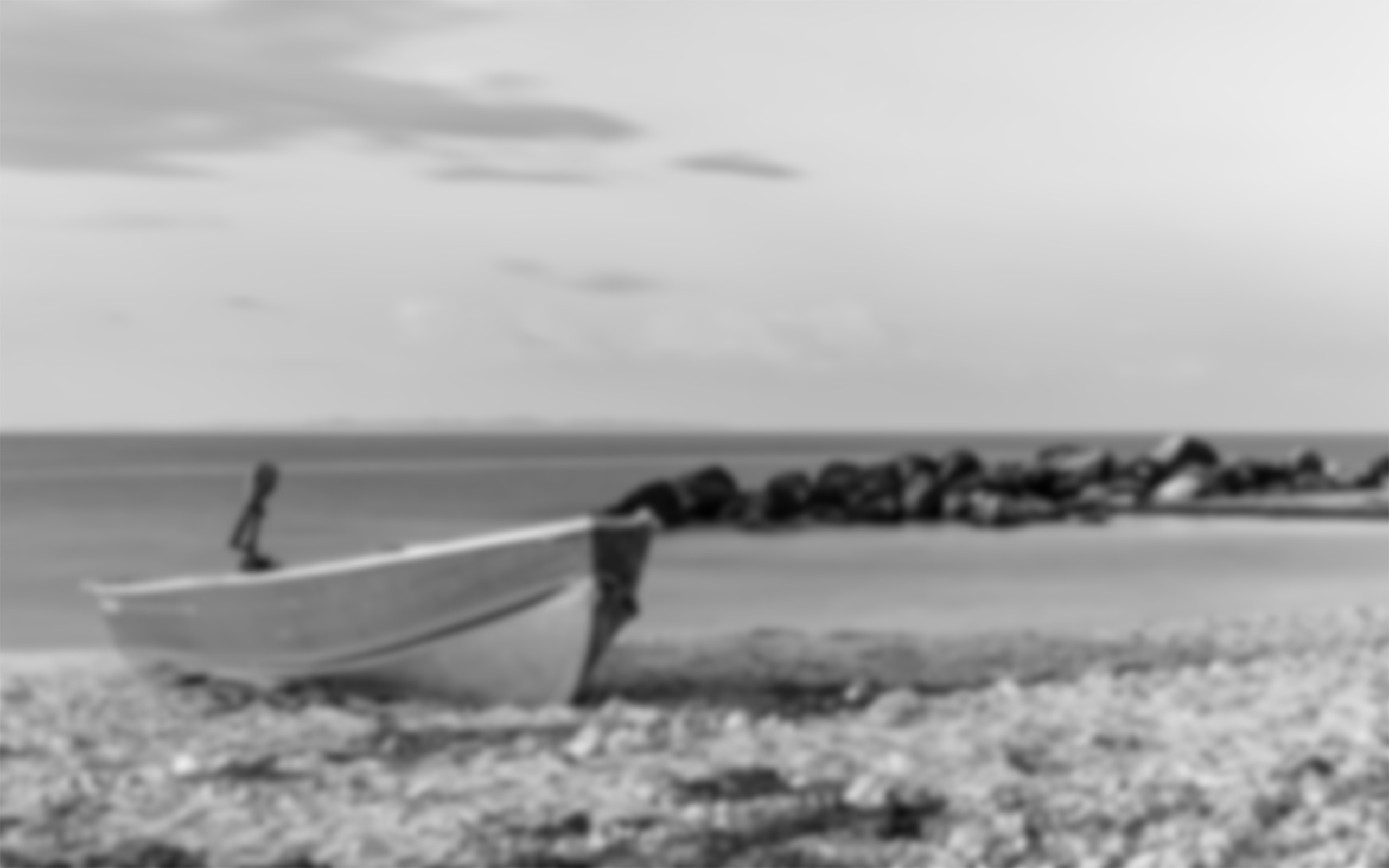 A boat on a beach.