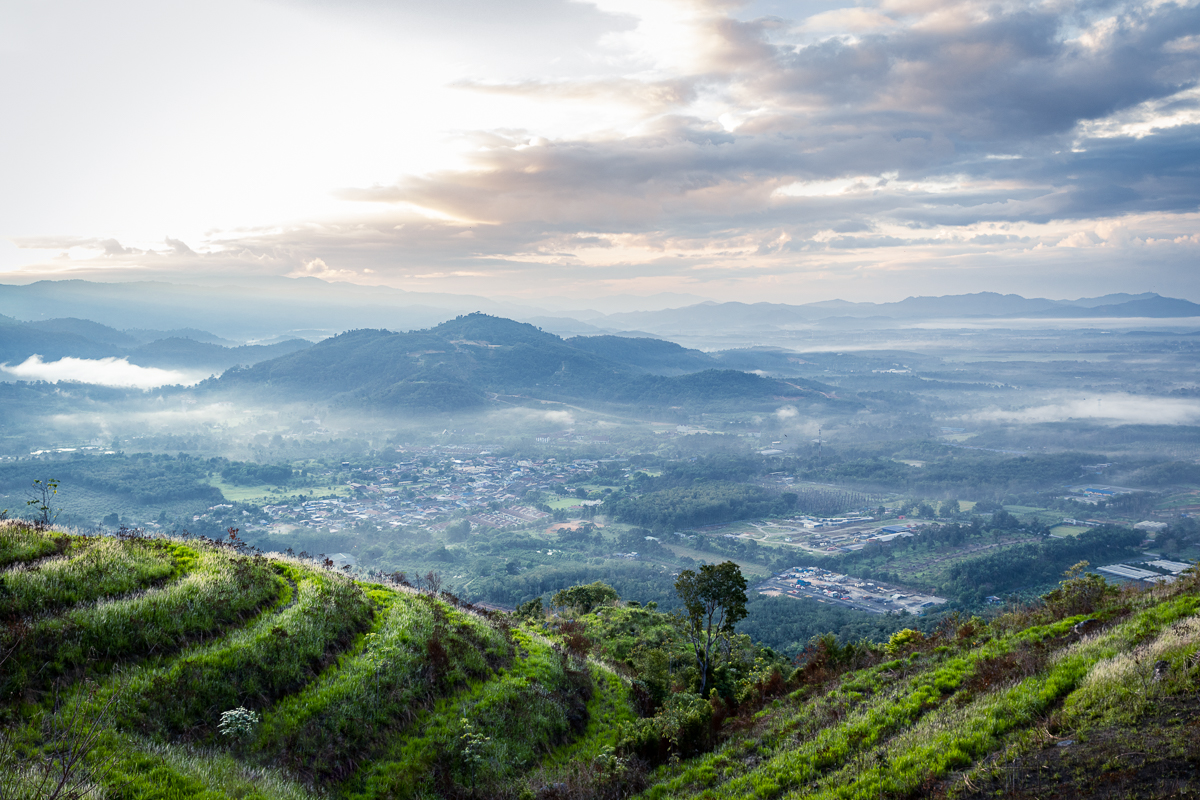 A view from a hill at sunrise.