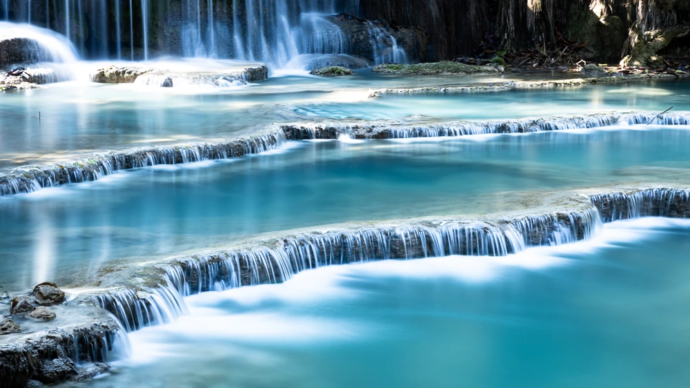 The Kuang Si Waterfall in Laos. Clik here to go to the page 'South East Asia'.